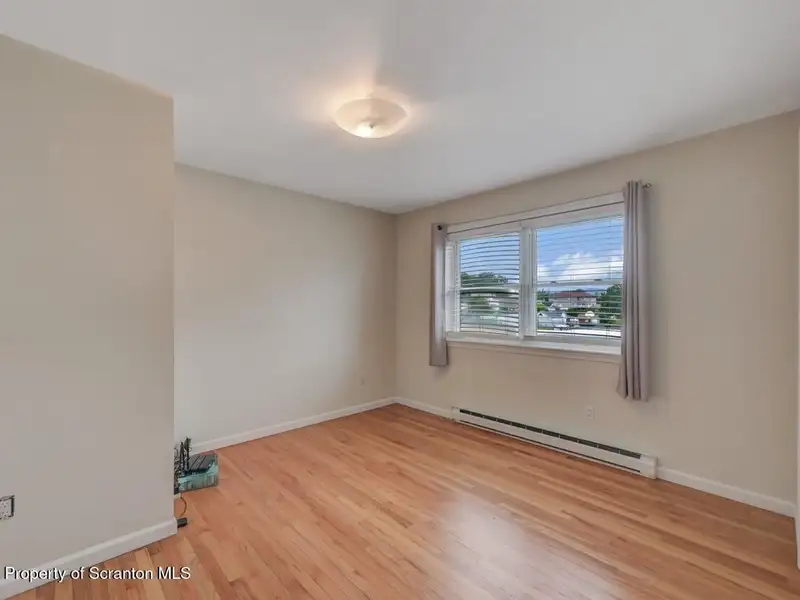 Mixed-use Property in Throop: 7-bay Garage and Updated 2-bedroom Apartment
