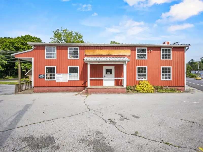 Commercial Retail/warehouse with Charming Colonial Home in High-traffic Corner Location