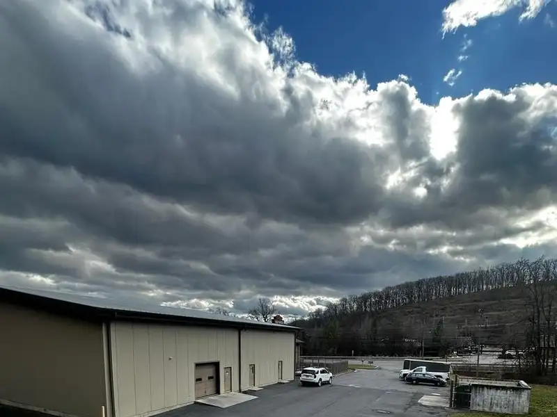 Versatile Commercial Property with Showroom, Offices, and Large Metal Building in Prime Location