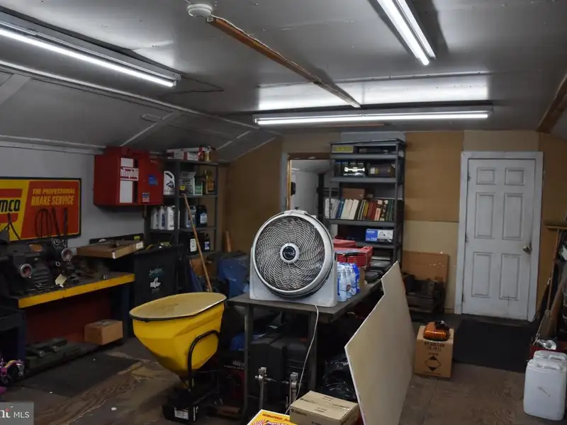 Versatile 3000+ Sq Ft Commercial Space in Prime Village Location with Auto Repair Facilities