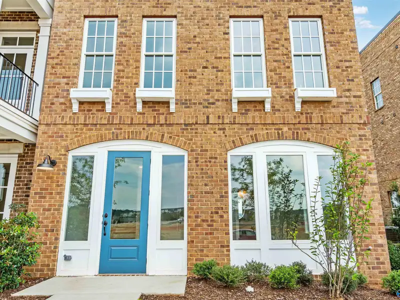 Live/work Townhome with Flex Space, Gourmet Kitchen, and 2-car Garage in Prime Location