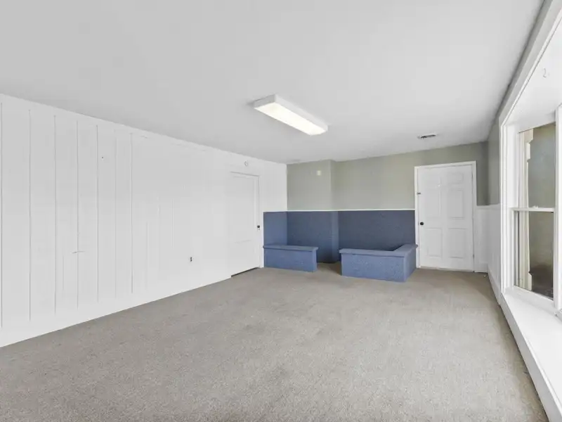 Versatile 4,305 Sq Ft Office Building with Apartment on Highway 11e