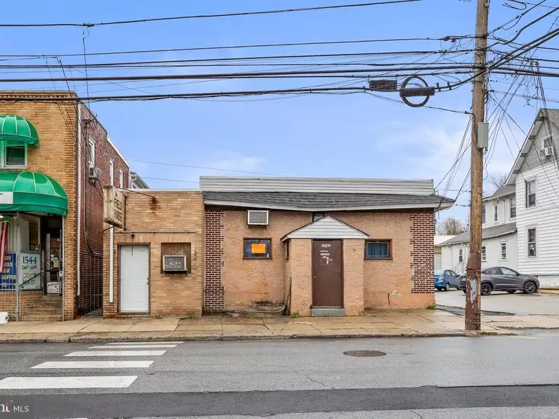 Charming 3-bedroom Single Family Home with Detached Garage and Bar in Folcroft