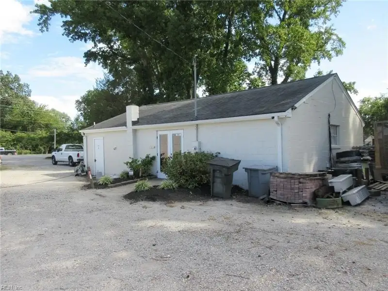 Turnkey Fully Leased Office Building with Garages in Prime Langley Afb Location