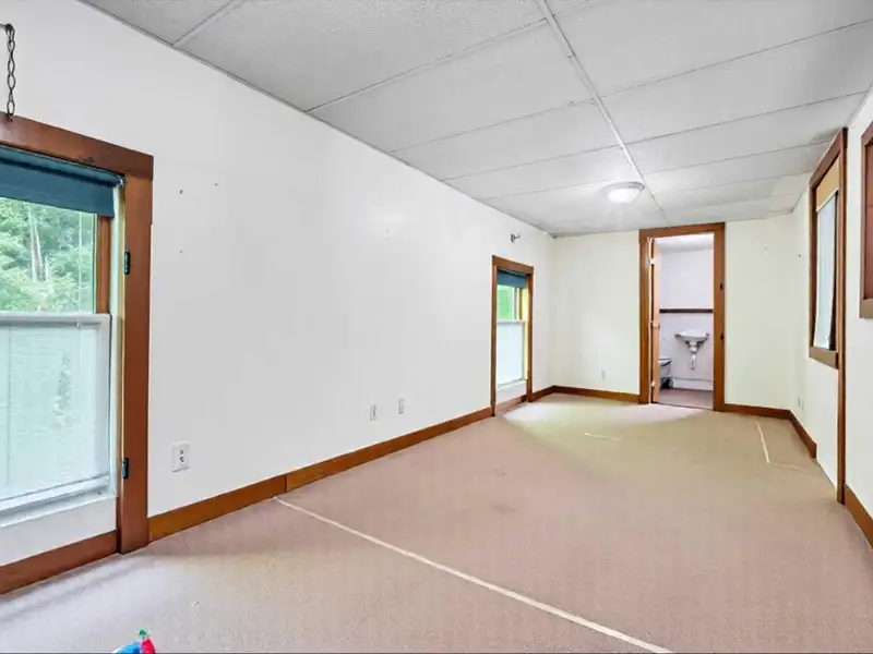 Commercial Retail/warehouse with Charming Colonial Home in High-traffic Corner Location