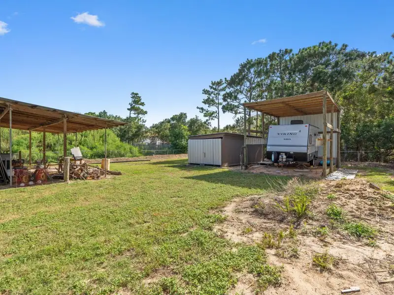 30x30 Enclosed Quonset Building with Pole Barn and Storage on Hwy 98