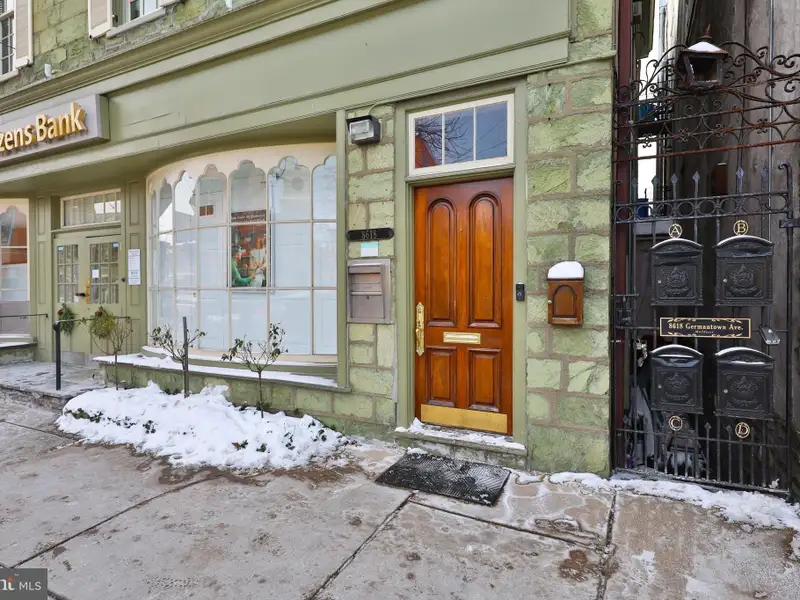 Historic Multi-use Building in Chestnut Hill Business District with Retail and Residential Units