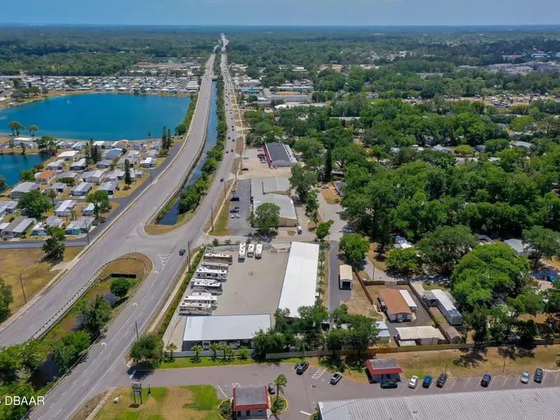 Mixed Use Property: Light Industrial Lot with Adjoining Residential Home and Expansion Potential
