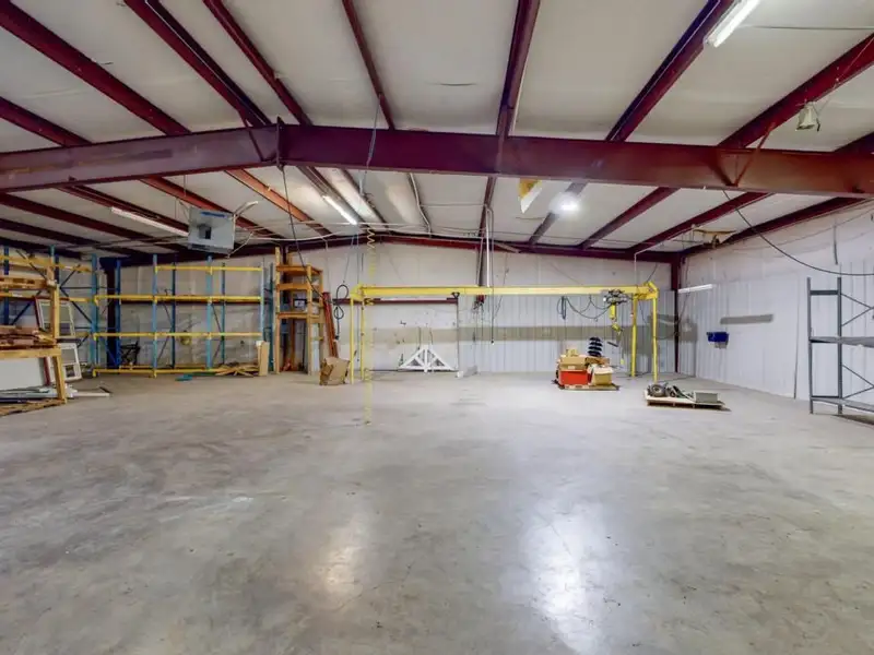 Commercial Property on Busy Highway - 2.1 Acres, 31,000 Sq Ft with Offices and Roll-up Doors