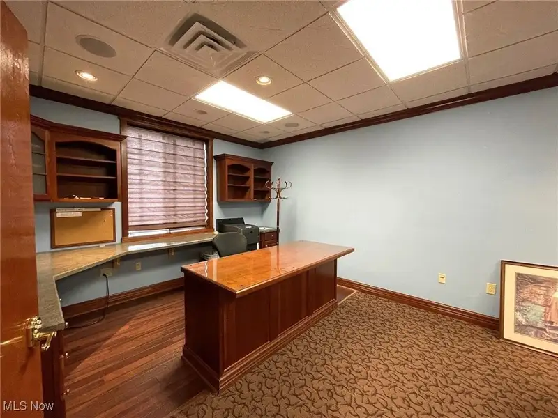 Well-maintained Two-story Brick Building with Retail and Workshop Space in Ne Location