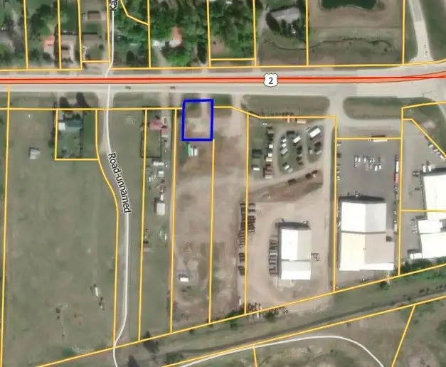 Flexible Development Site with Highway 2 Access and Income-generating Cell Tower