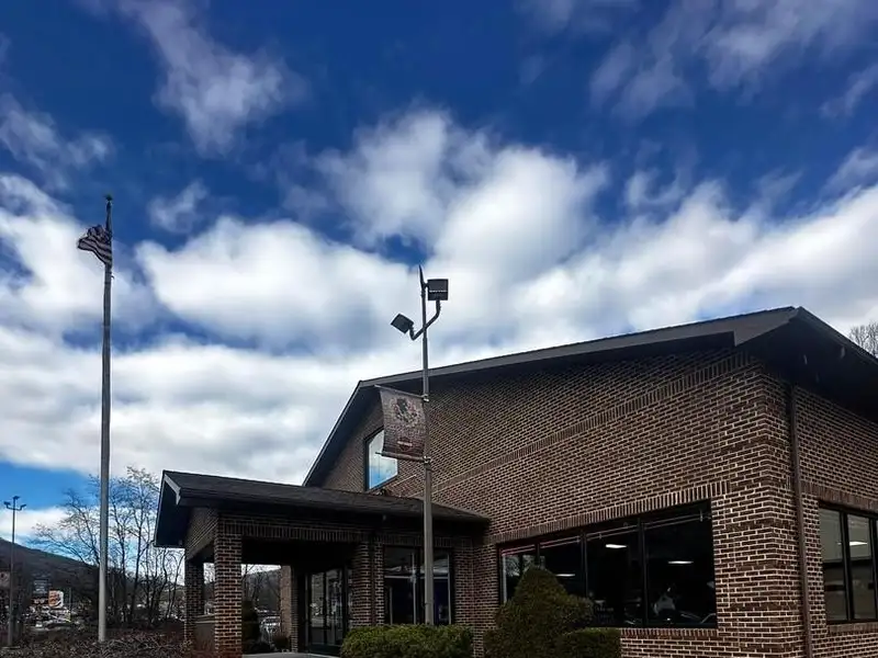 Versatile Commercial Property with Showroom, Offices, and Large Metal Building in Prime Location