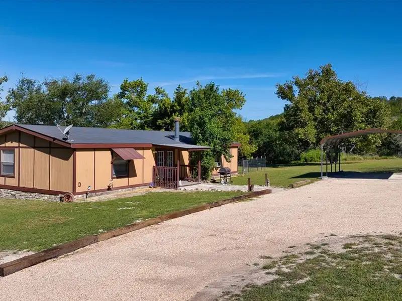 10-acre Mobile Home Community with 5 Units, Fenced, Workshop, and Growth Potential