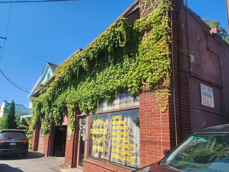 Versatile Commercial Property with Garage Bays and Billboard Income in Prime Location