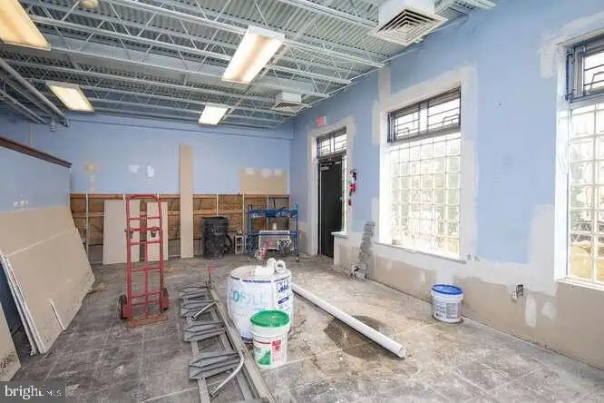 Versatile 6,000 Sq Ft Commercial Space in Prime Location with Parking Potential