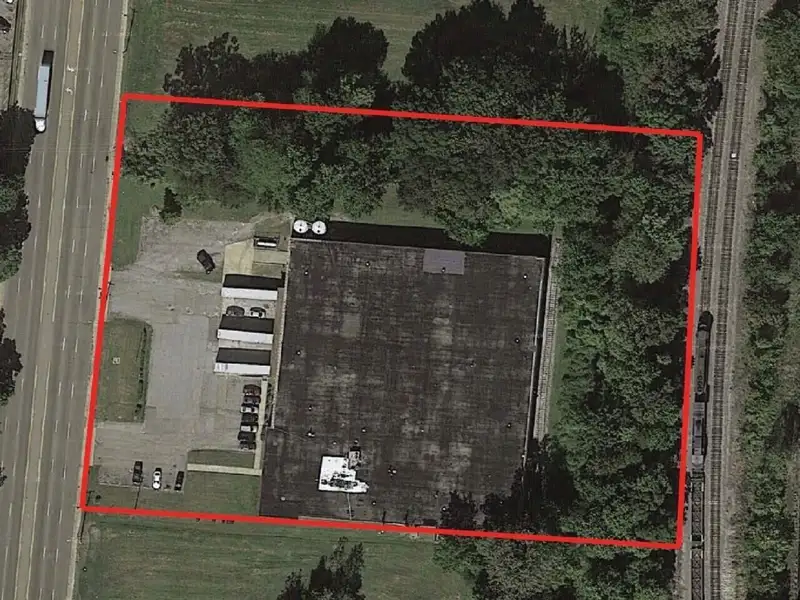 57,500 Sf Industrial Property with Office Space and Dock Access in Prime Location