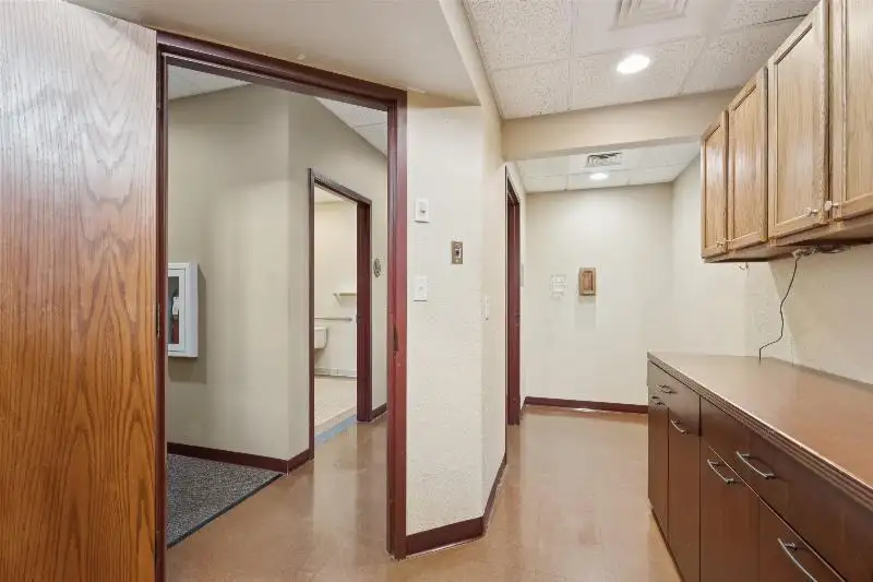 Versatile Commercial Condo for Sale Near Hwy 151 & 41 with Multiple Offices and Amenities