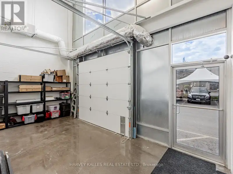 Fully Leased Commercial Condo in Prime Location on the Queensway