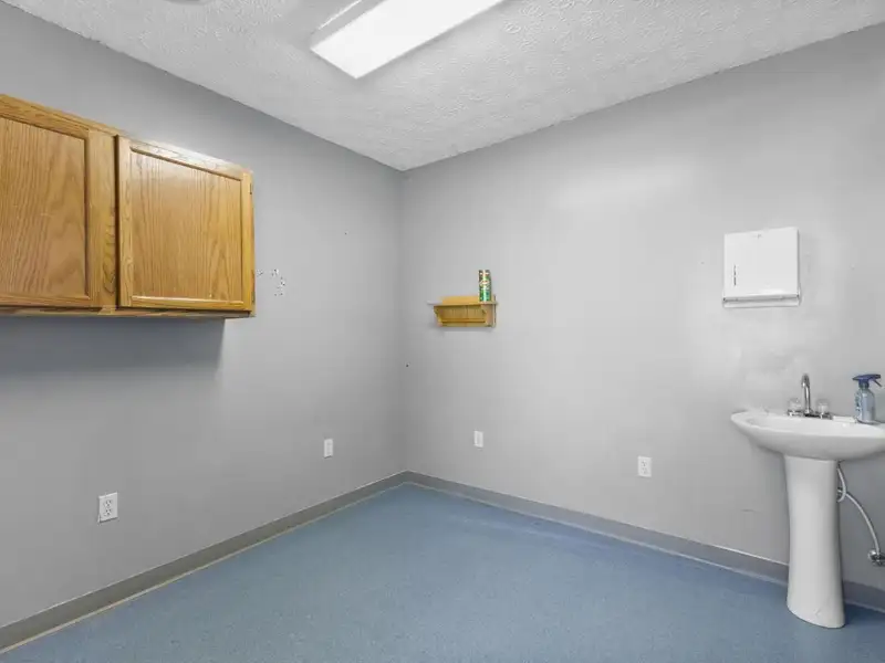 Versatile 4,305 Sq Ft Office Building with Apartment on Highway 11e