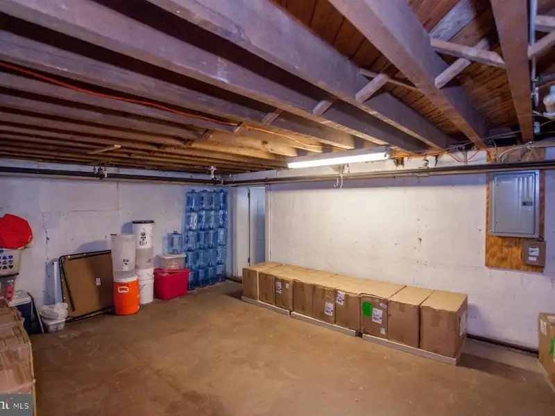 Multi-unit Building with Commercial Space and Two Residential Apartments in Established Location