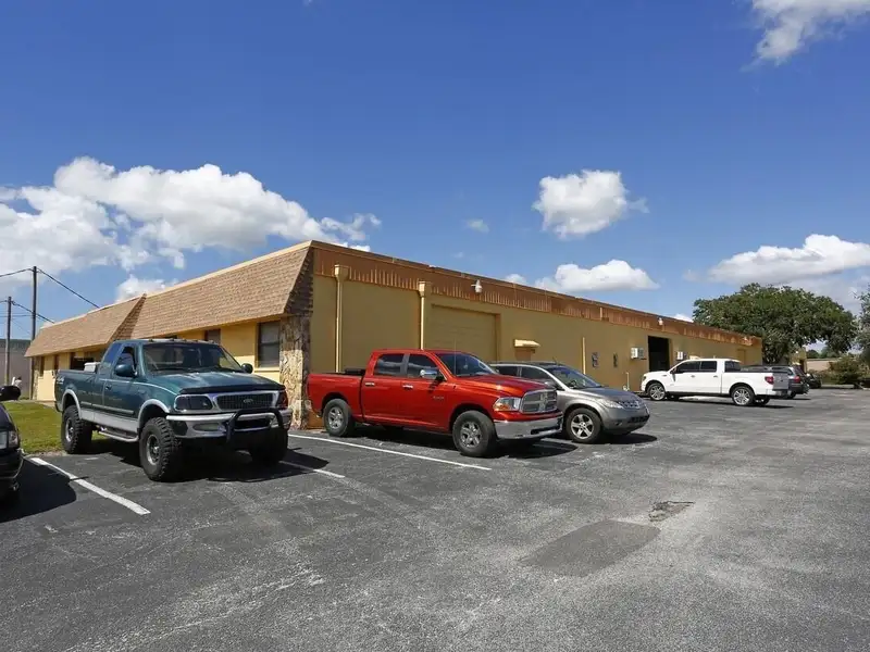 Industrial Property for Sale in Clearwater: Two Buildings with Office Space and Garage Access