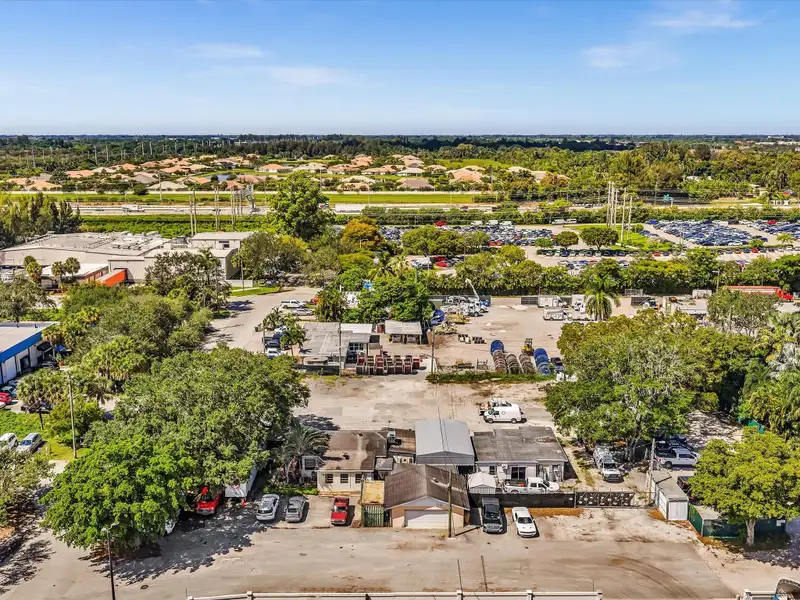 Commercial Property with Office Space and Residential Unit in Industrial Area