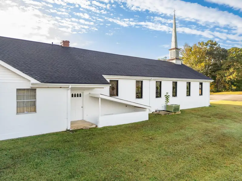 Historic Former Methodist Church in Mcminn County with Stained Glass and Southern Charm