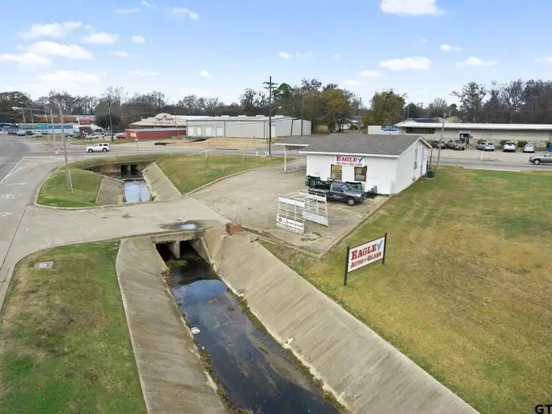 Prime Commercial Property with Building and Home on Half Acre Lot