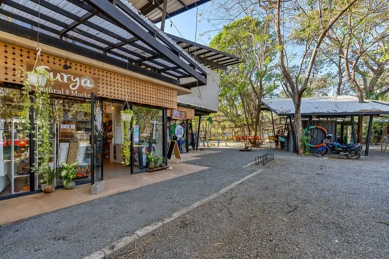 Commercial Plaza for Sale in Playa Avellanas, Features Restaurants, Shops, and Community Space