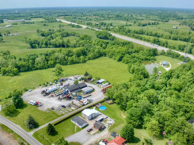 Commercial Property on 10 Acres Next to I-75, Includes Repair Shop and House