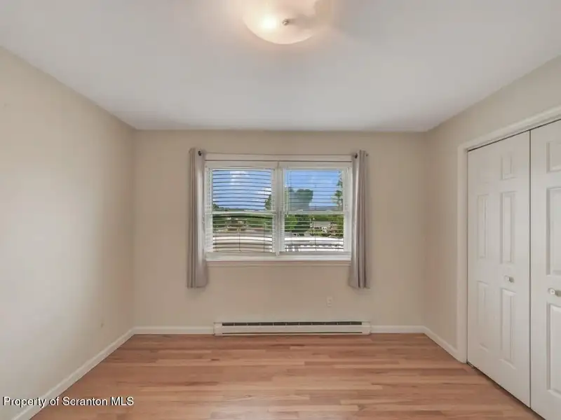 Mixed-use Property in Throop: 7-bay Garage and Updated 2-bedroom Apartment