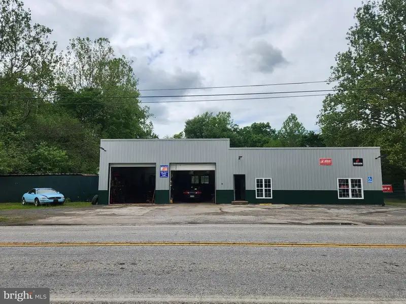 Versatile 9-acre Property with Salvage Yard, Auto Repair Shop, and Approved Car Sales Lot