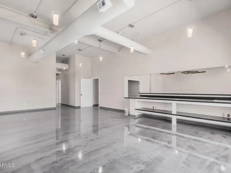 Versatile Commercial Property with Two Buildings and Ample Parking in Prime Location