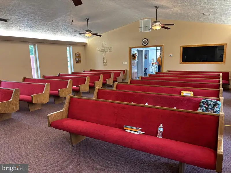 Versatile Metal Frame Building with Parking Lot in Prime Location, 0.33 Acres