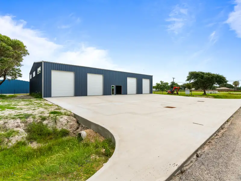 5,700 Sq Ft Warehouse on ½ Acre in Rockport, Texas with Highway Access and Parking