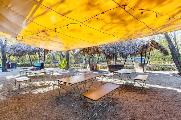 Commercial Plaza for Sale in Playa Avellanas, Features Restaurants, Shops, and Community Space