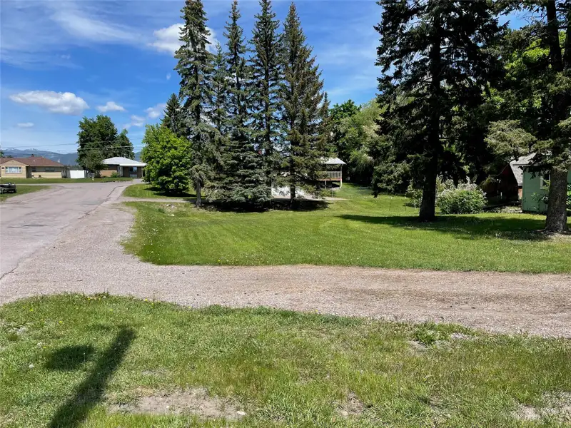 Commercial Corner Lot with 3 Bed Home in Columbia Falls, High Traffic Area