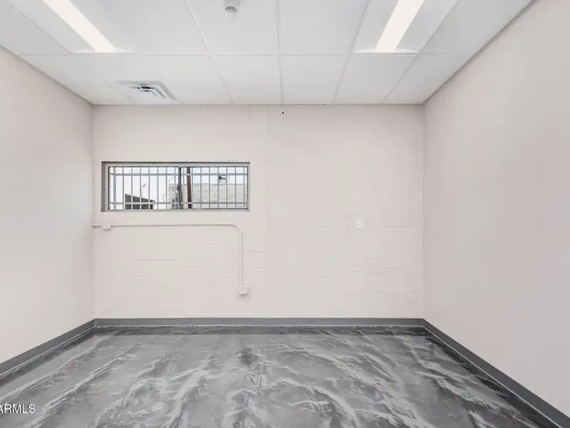 Versatile Commercial Property with Two Buildings and Ample Parking in Prime Location