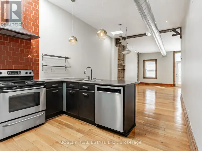 Charming Two-storey Apartment in Landmark Building on Queen St West