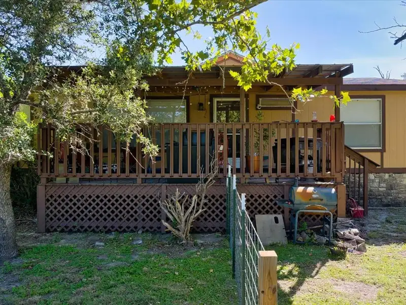 10-acre Mobile Home Community with 5 Units, Fenced, Workshop, and Growth Potential