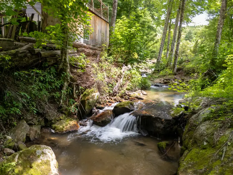Serene 5.81-acre Retreat with Pavilion, Barn, Home, and Bold Creek Access