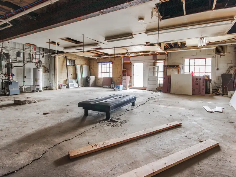 Mixed-use Two Unit Building with Remodeled Three Bedroom Apartment in Prime Location