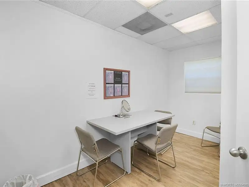 Versatile Office Building with Therapy Rooms and Break Area in R-3a Zoning