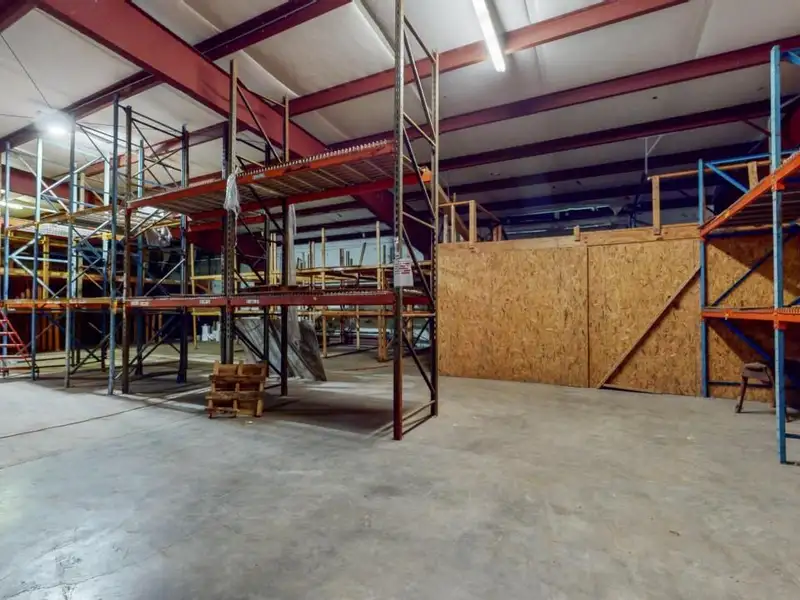 Commercial Property on Busy Highway - 2.1 Acres, 31,000 Sq Ft with Offices and Roll-up Doors