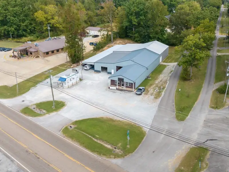 Large Commercial Building on Highway 412e in Parsons with Extensive Frontage and Warehouse Space