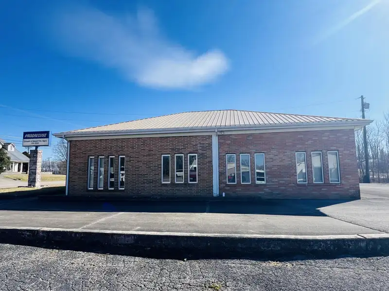 Historic Downtown Brick Building with Vault, Ideal for Office or Retail Conversion