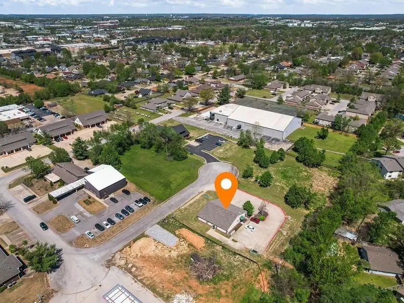 Versatile 2,752 Sq Ft Office Building in Central Rogers with Five Private Offices