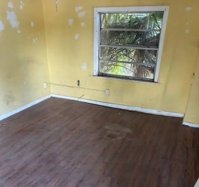 Multi-parcel Offering: Two-story Building with Renovation Potential in Prime Location