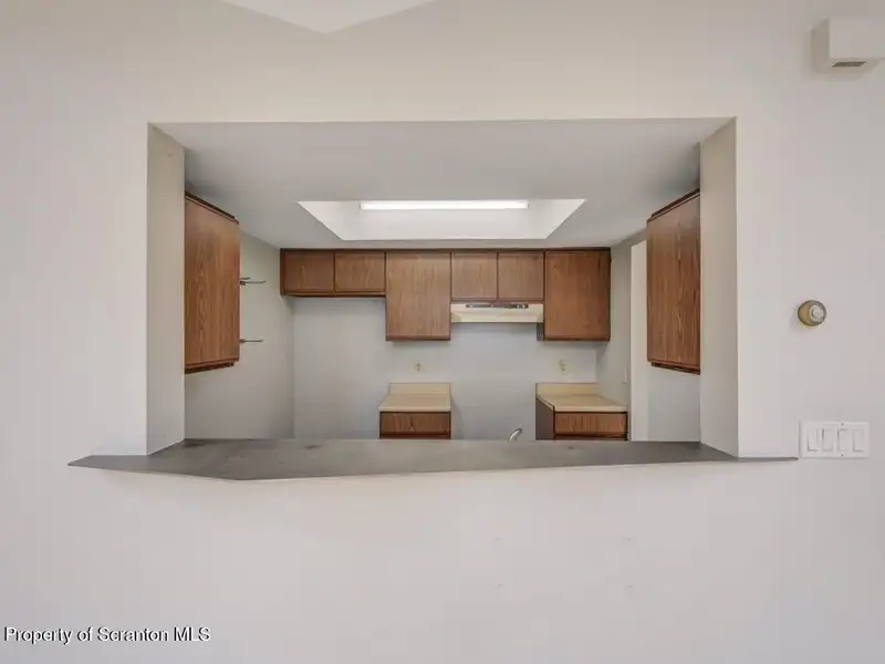 Mixed-use Property in Throop: 7-bay Garage and Updated 2-bedroom Apartment