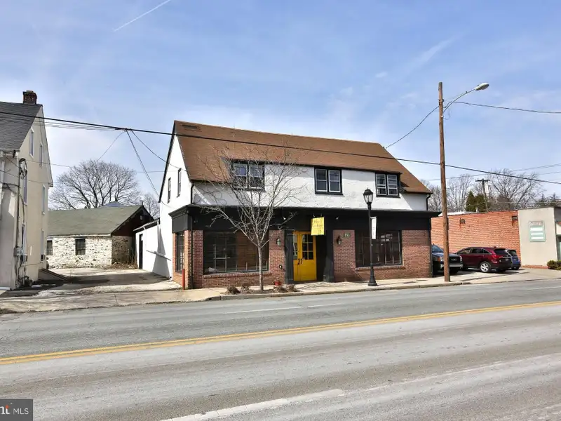 Mixed-use Commercial Property with Office, Garage, and Apartment in Flourtown